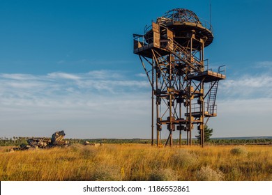Old rusty iron abandoned watch tower in wastelands 