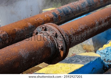 Old rusty iron pipe joints. Geothermal gas distribution pipes. Industrial concept. For graphic design, 3D design and banner background