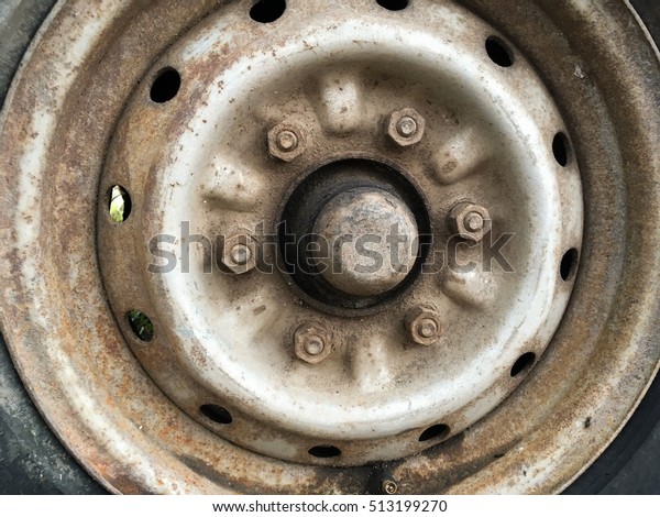 old rusty metal alloy wheel\
car 