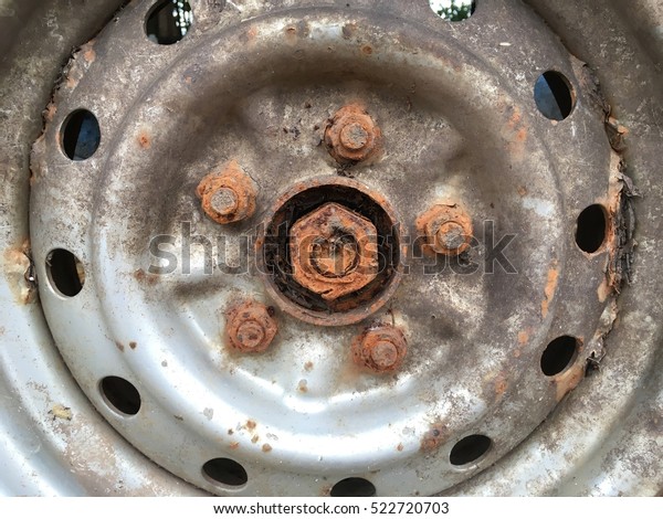 old rusty metal alloy wheel\
car