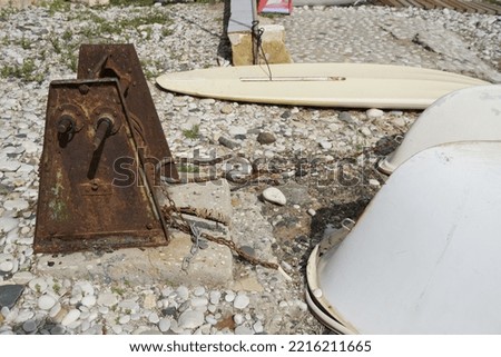 Old Rusty metal boat winch at Altea Beach, Alicante, Spain