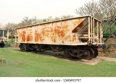Old rusty out of order train of mining , Abandonned train on green garden
