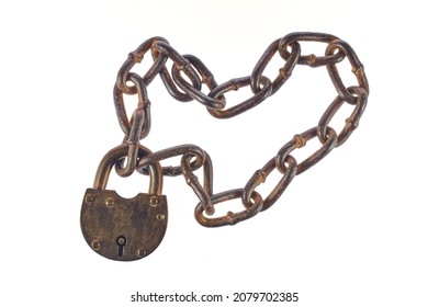 An old rusty padlock closed on a massive chain. Isolated on white background