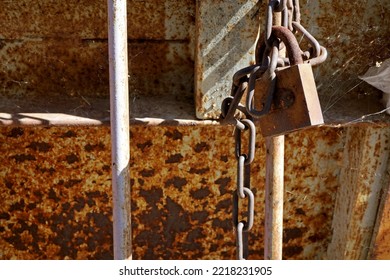 Old Rusty Padlock On Chain