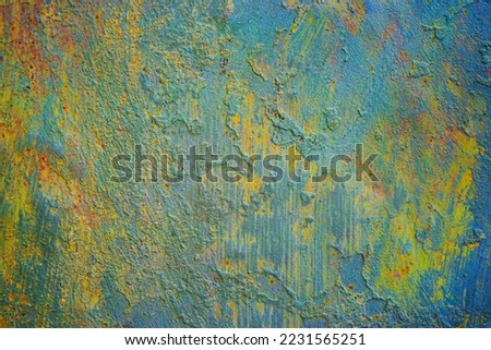 Old rusty painted metal wall. Blue green yellow orange abstract background for design. Rust. Strokes, spots. Grunge. Colorful rough surface. Damaged, distressed.