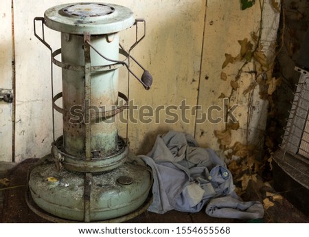 Old rusty paraffin room heater
