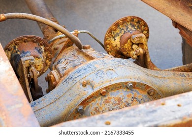 Old Rusty Rear Truck Axle Housing Is Under The 6 Wheel Medium Duty Truck