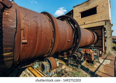 Old Rusty Rotating Kiln In Cement Manufacturing Plant