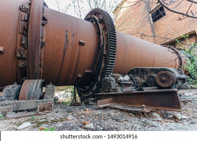 Old Rusty Rotating Kiln In Cement Manufacturing Plant