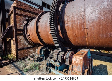 Old Rusty Rotating Kiln In Cement Manufacturing Plant