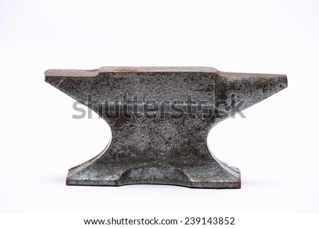 Old rusty rugged anvil.
