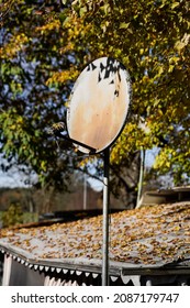 An Old Rusty Satellite Dish From A Trailer Park.