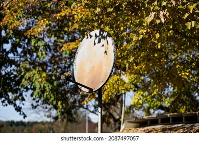 An Old Rusty Satellite Dish From A Trailer Park.