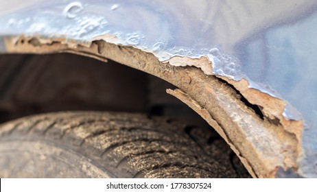 Old rusty scratch on a car body, closeup. - Shutterstock ID 1778307524