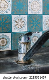 Old Rusty Sink Faucet In Kitchen. Rust Streaks, Calcium Scale, Hard Water. Concept Of Poor Water Quality.