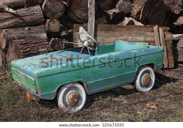 Old rusty small auto for\
children