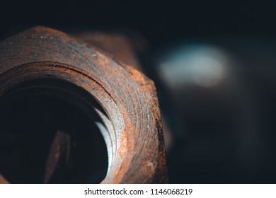 Old rusty threaded nut and bolt connection
