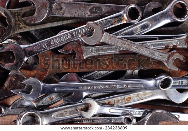Old rusty tools\
for car repairs. Wrenches.
