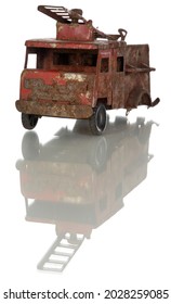 Old Rusty Toy Fire Truck With A Ladder On A White Background