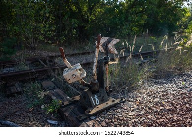 Old And Rusty Train Signal Box On Abandoned Railway Line	
