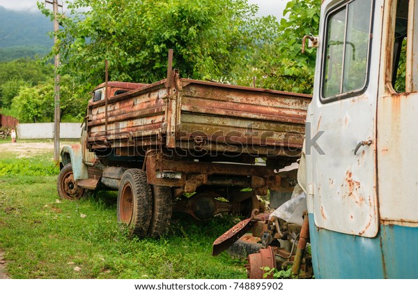 Old rusty truck and\
bus