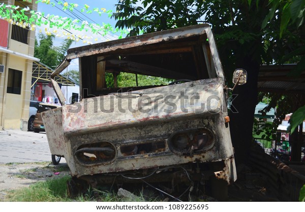 Old rusty truck in the\
Philippines.