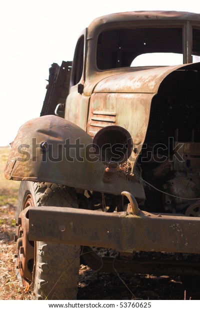 old rusty truck stay on\
the ground