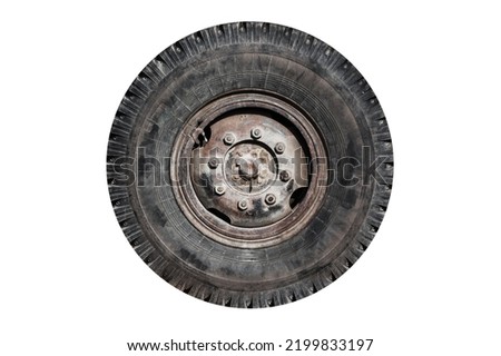 Old rusty truck wheel isolated on white background, front view