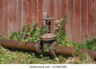 Old Rusty Urban Water Supply Pipeline With Valve.