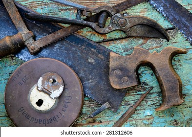 Old Rusty Vivid Tools On Work Bench