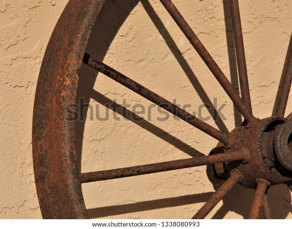 Old Rusty Wagon Wheel Leaning On Stock Photo Edit Now 1338080993