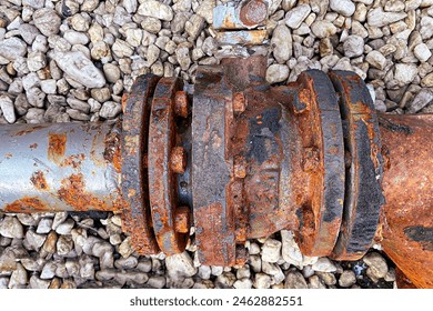 Old and rusty water pipes, pipe connectors, pipeline repair