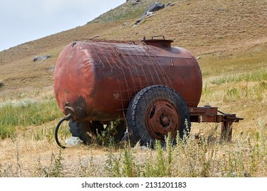 Old Rusty Water Tank On Wheels Stock Photo 2131201183 | Shutterstock