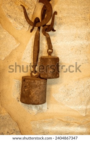 Old rusty weights with old scale