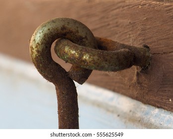Old rusty window stopper