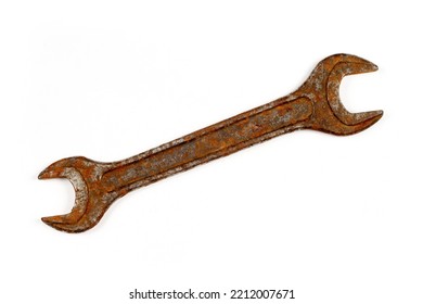 An old rusty wrench on a white background. Vintage wrench close-up. - Shutterstock ID 2212007671