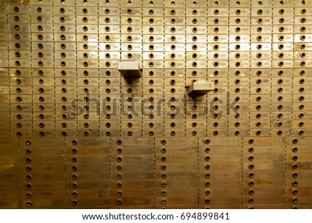 Old Safe Deposit Boxes with two open.