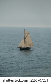 old sailing boat ship coming in to cornwall harbour