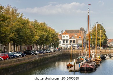 Old sailing ships in the harbor of the picturesque town of Zierikzee in the province of Zeeland, Netherlands.
