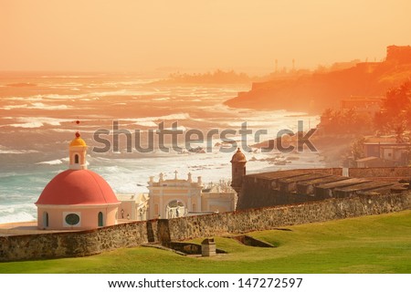 Old San Juan ocean view with buildings in red tone