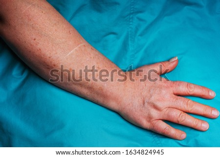 Similar – Image, Stock Photo Serenity in stitches. Elderly Asian woman knits at home.