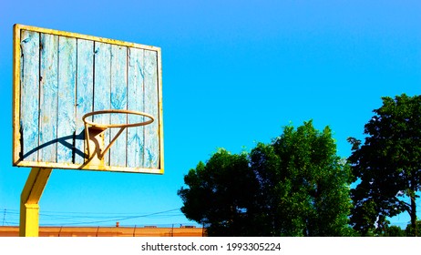 Old School Basketball Rim In Ghetto