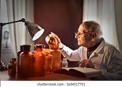 
Old Scientist Tests Liquids In His Laboratory