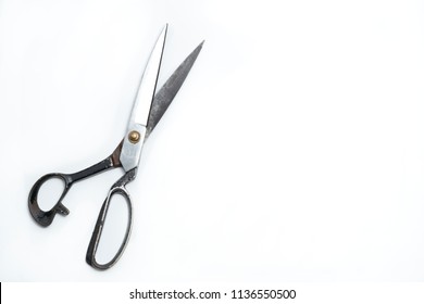 Old Scissors For Cutting Fabric On White Background Space For Text.