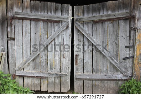 Old scrappy doors, black and white image
