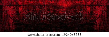 Old scratched bright red paint surface wide texture. Dark scarlet color gloomy grunge abstract widescreen background