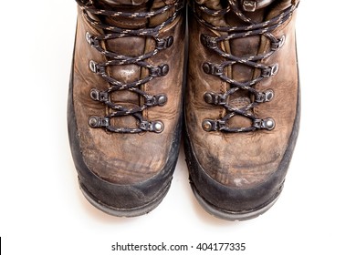 Old Scuffed Hiking Boots Isolated On White Background