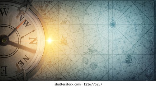 Old sea compass on abstract map background. Pirate and nautical theme grunge background. Retro style.