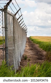 Old Security Fence At The Edmonton International Airport.