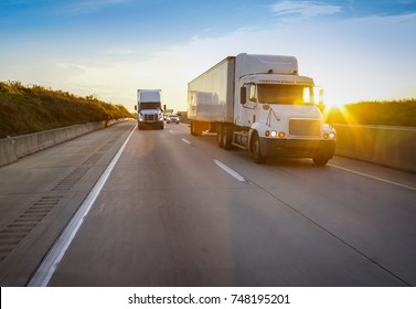 Old Semi Truck On Road With Sun Flare